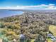 Aerial view showcasing the neighborhood's location near the lake at 405 Mission Ln, Howey In The Hills, FL 34737