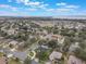 Aerial view of house and neighborhood, showcasing the property's location and surrounding area at 4520 Abaco Dr, Tavares, FL 32778