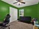 Multipurpose bedroom with a gaming chair and a sofa bed at 4520 Abaco Dr, Tavares, FL 32778