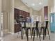 Kitchen with breakfast bar and modern finishes at 4520 Abaco Dr, Tavares, FL 32778