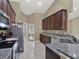 Spacious kitchen with granite countertops and modern appliances at 4520 Abaco Dr, Tavares, FL 32778