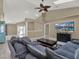 Comfortable living room with large TV and seating area at 4520 Abaco Dr, Tavares, FL 32778