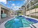 Inviting pool with a screened enclosure at 4520 Abaco Dr, Tavares, FL 32778