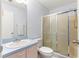 Small bathroom with shower/tub combo, vanity, and a toilet at 453 Hildalgo Dr, Lady Lake, FL 32159