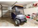 Garage with golf cart and ample storage space at 453 Hildalgo Dr, Lady Lake, FL 32159