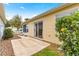 Small patio area with sliding glass doors leading to the house at 453 Hildalgo Dr, Lady Lake, FL 32159