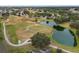 Aerial view of golf course and surrounding area at 4557 Antietam Creek Trl, Leesburg, FL 34748