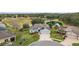 Aerial view of house and surrounding neighborhood at 4557 Antietam Creek Trl, Leesburg, FL 34748