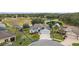 Aerial view of house and surrounding neighborhood at 4557 Antietam Creek Trl, Leesburg, FL 34748