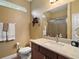 Bathroom with single vanity and a shower at 4557 Antietam Creek Trl, Leesburg, FL 34748