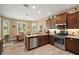 Spacious kitchen with stainless steel appliances and granite countertops at 4557 Antietam Creek Trl, Leesburg, FL 34748