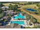 Resort-style pool with lap lanes and lounge area at 4557 Antietam Creek Trl, Leesburg, FL 34748