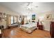 A large, comfortable main bedroom with neutral tones and ample closet space at 4822 Sawgrass Lake Cir, Leesburg, FL 34748