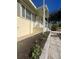 Front entrance with walkway and newly planted flowers at 505 W 10Th Ave, Mount Dora, FL 32757