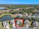 Bird's-eye view of house and surrounding landscape at 6319 Berkshire Pass, Leesburg, FL 34748