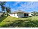 House exterior showcasing a well-maintained lawn at 6319 Berkshire Pass, Leesburg, FL 34748