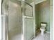 Bathroom with shower and toilet at 6319 Berkshire Pass, Leesburg, FL 34748