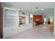 Dining room with built-in white cabinetry and a view at 6319 Berkshire Pass, Leesburg, FL 34748