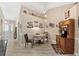 Bright dining area showcasing a wood table and entryway view at 6525 Borg St, Leesburg, FL 34748