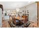 Elegant dining room with chandelier and hardwood floors at 6525 Borg St, Leesburg, FL 34748