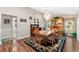 Spacious dining room featuring a chandelier and wood flooring at 6525 Borg St, Leesburg, FL 34748