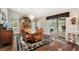 Bright dining room featuring a wooden table, chandelier, and hardwood floors at 6525 Borg St, Leesburg, FL 34748