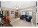 Relaxing sitting room featuring comfortable armchairs and built-in shelving at 6525 Borg St, Leesburg, FL 34748