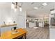 Bright dining area with wood table and modern chairs at 7237 Edmund Ct, Mount Dora, FL 32757