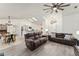 Charming dining area with a rustic farmhouse table and chandelier at 7237 Edmund Ct, Mount Dora, FL 32757