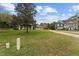 House exterior view with driveway and landscaping at 7237 Edmund Ct, Mount Dora, FL 32757