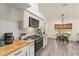 Kitchen with wood countertops and stainless steel appliances at 7237 Edmund Ct, Mount Dora, FL 32757