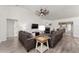 Relaxing living room with comfortable seating and large windows at 7237 Edmund Ct, Mount Dora, FL 32757