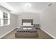 Spacious bedroom with queen bed and natural light at 7470 Lake Marsha Dr, Orlando, FL 32819