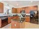 Well-equipped kitchen with granite countertops and ample cabinetry at 804 Orange Cosmos Blvd, Davenport, FL 33837