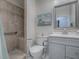 Updated bathroom with walk-in shower and grab bars at 830 Cortez Ave, The Villages, FL 32159