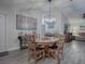 Bright dining room featuring a wood table and chairs, hardwood floors at 830 Cortez Ave, The Villages, FL 32159