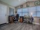 Home office with wood desk, comfortable seating, and plenty of natural light at 830 Cortez Ave, The Villages, FL 32159