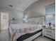 Main bedroom with king-size bed, nightstands, and ample closet space at 830 Cortez Ave, The Villages, FL 32159