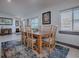 Bright dining area with wooden table and chairs, perfect for Gathering meals at 908 N Lakeshore Blvd, Howey In The Hills, FL 34737