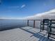 Lakefront dock with seating, offering scenic views at 908 N Lakeshore Blvd, Howey In The Hills, FL 34737