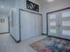 Entryway with tile floors and sliding doors at 908 N Lakeshore Blvd, Howey In The Hills, FL 34737