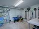 Well-organized workshop with ample storage and tools at 908 N Lakeshore Blvd, Howey In The Hills, FL 34737