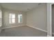 Bright bedroom with neutral walls and carpet flooring at 10049 Ballast Dr, Orlando, FL 32827