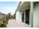 Private backyard with patio and sliding glass door access at 1015 Stucki Ter, Winter Garden, FL 34787