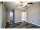 Spacious bedroom with multiple entry points and ceiling fan at 1015 Stucki Ter, Winter Garden, FL 34787