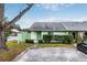 Townhome exterior with landscaped yard at 1015 Stucki Ter, Winter Garden, FL 34787