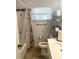 Bathroom with shower/tub combo and vanity at 11221 Lake Eustis Dr, Leesburg, FL 34788