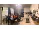 Eat-in kitchen with table and chairs, and ample cabinetry at 11221 Lake Eustis Dr, Leesburg, FL 34788