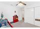 Bright bedroom with double closets and ceiling fan at 11272 Stewart Loop, Oxford, FL 34484