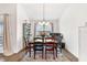 Dining area with wooden table and chairs, hardwood floors at 11272 Stewart Loop, Oxford, FL 34484